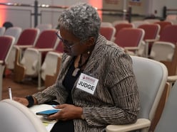 Judge taking notes during Lightning Talks