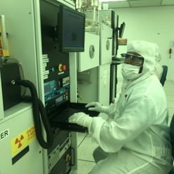 A M.O.R.E. Lab undergraduate researcher programs an e-beam evaporator run in the Georgia Tech IEN cleanroom to deposit thin metal films for device fabrication.
