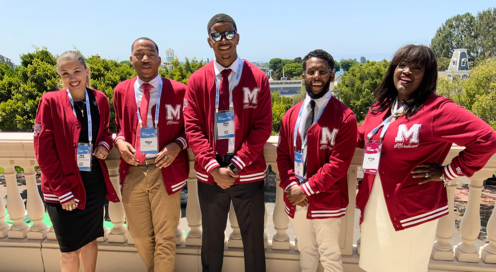 Morehouse future educators pose outside of the ASU/GSV conference in sunny San Diego. The conference is one of several annual travel and development opportunities for Morehouse Education Department students.