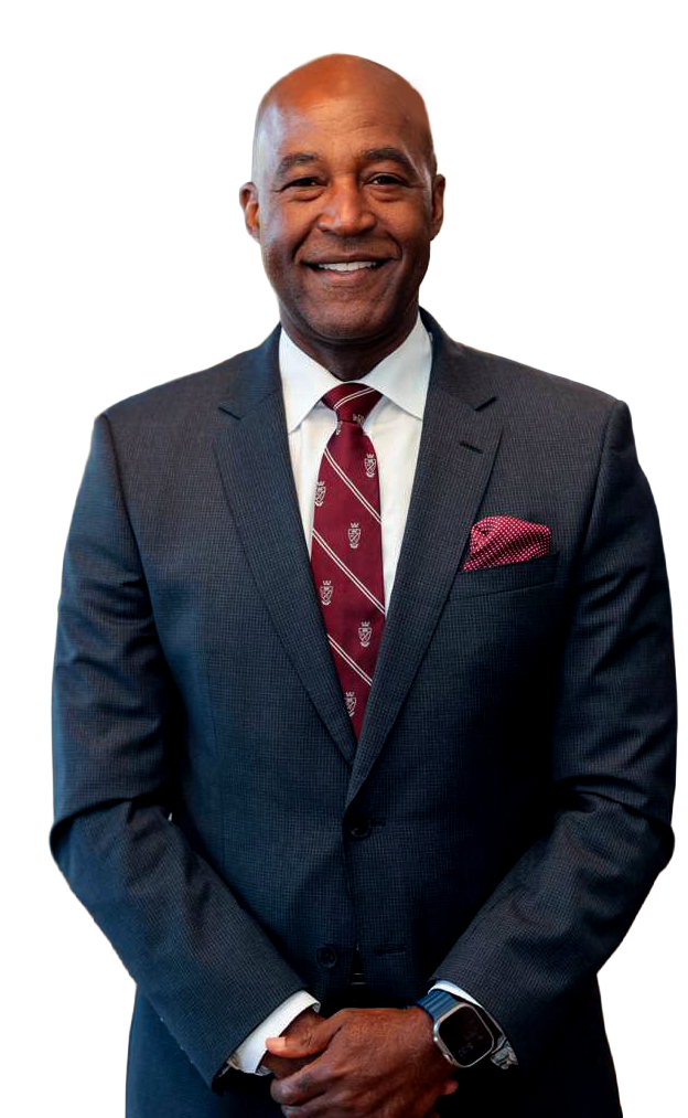 President F. DuBois Bowman in a charcoal suit and maroon Morehouse tie