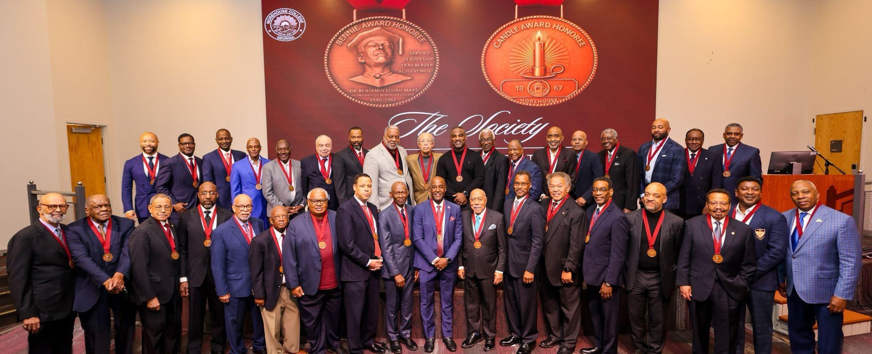 Bennie and Candle Award honorees wearing medallions at The Society induction